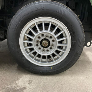 Clean tire on wet cement